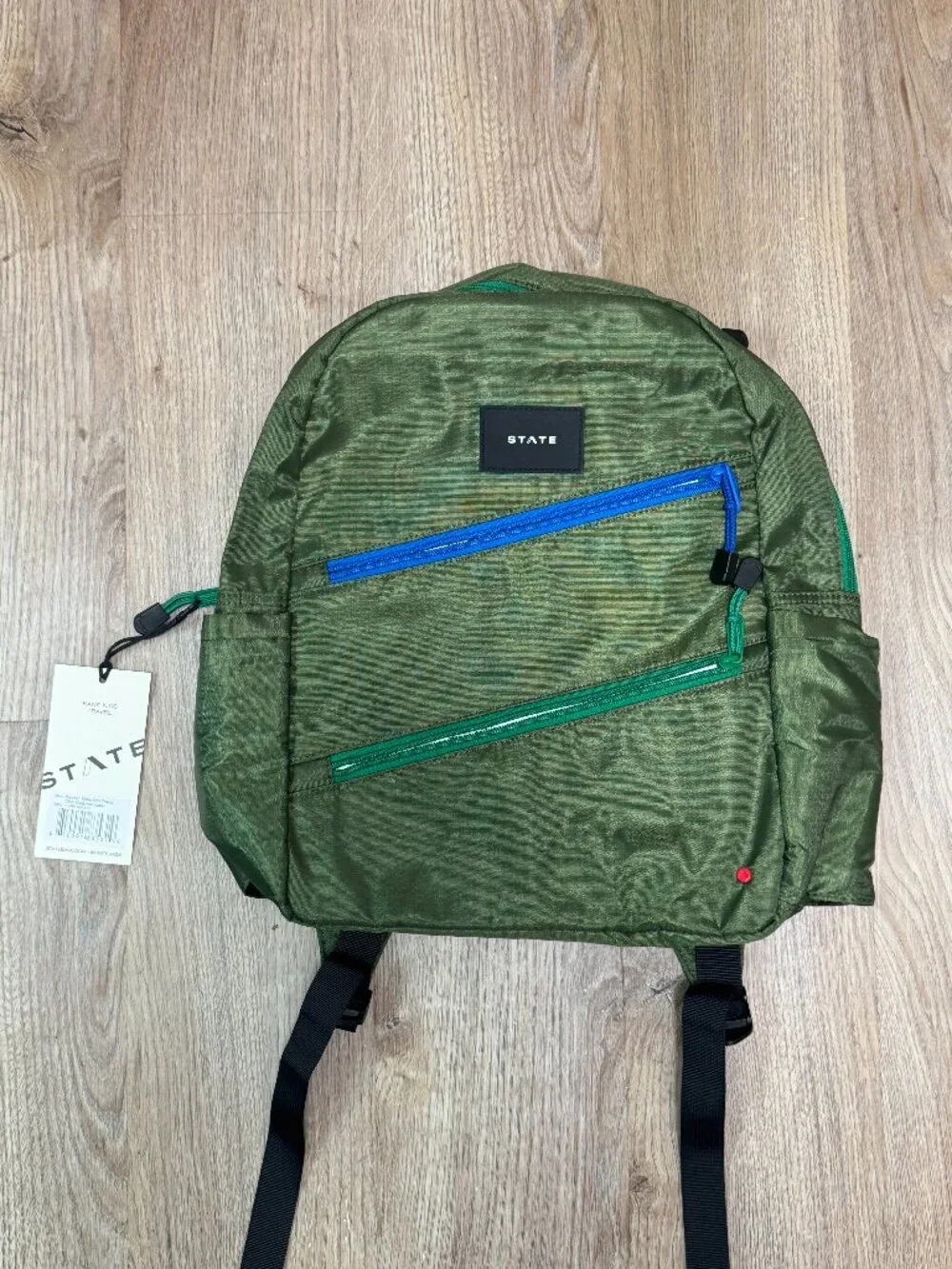 STATE Ripstop Kane Kids Travel Backpack Olive Green Diagonal Zipper Pink Handle
